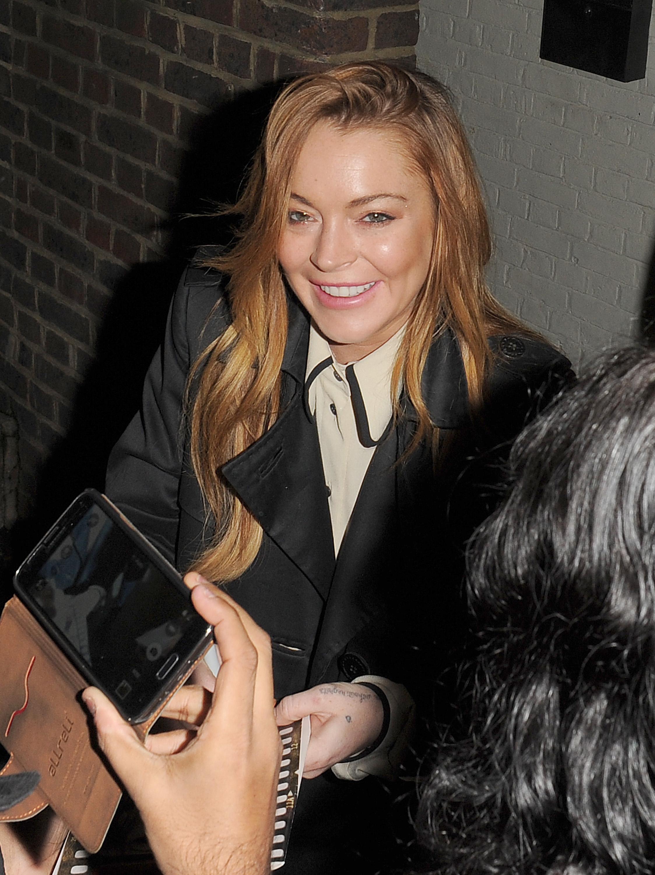 EXCLUSIVE: Lindsay Lohan seen out and about in London before going to the playhouse for her performance