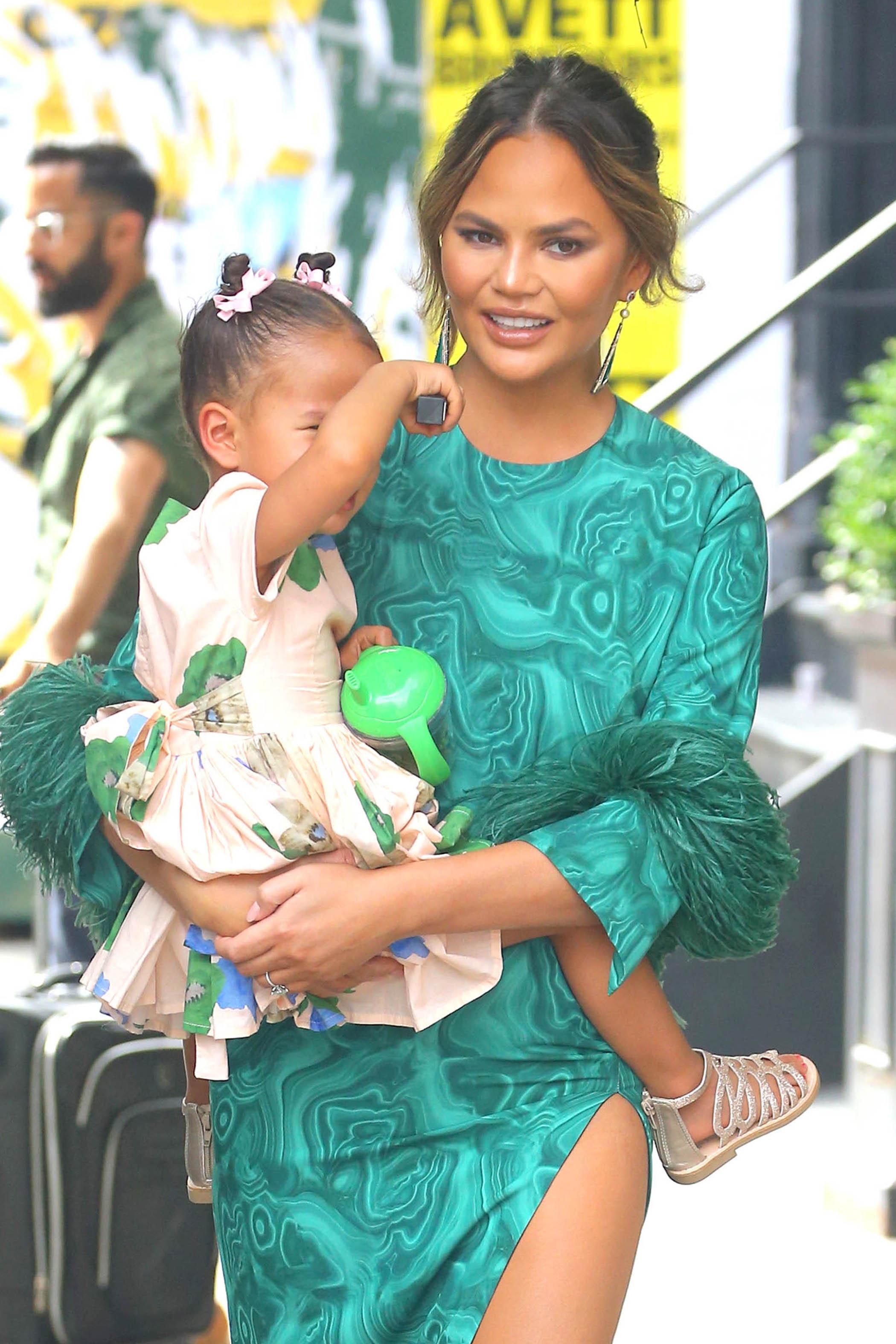 Chrissy Teigen and luna