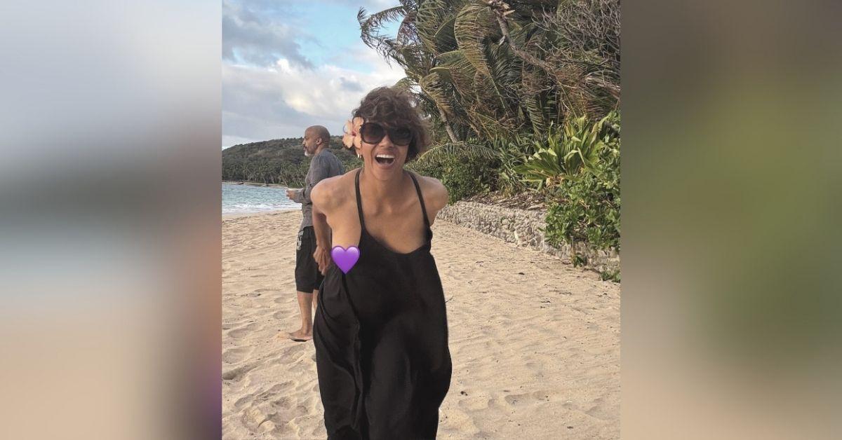 image of Halle Berry playfully covered an apparent wardrobe malfunction with a purple heart emoji before posting the beach photo on Instagram.