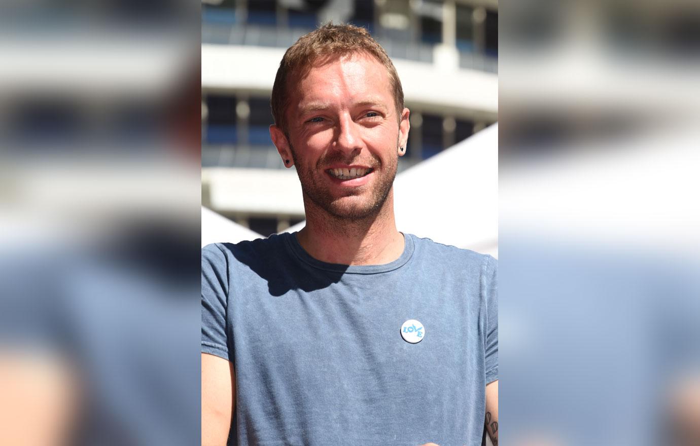 Chris martin blue tee shirt