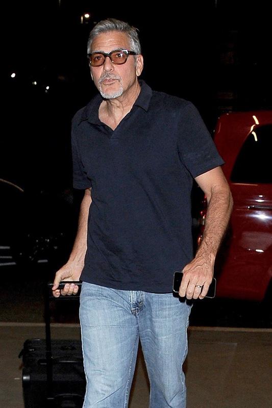 A casual George Clooney departs LAX