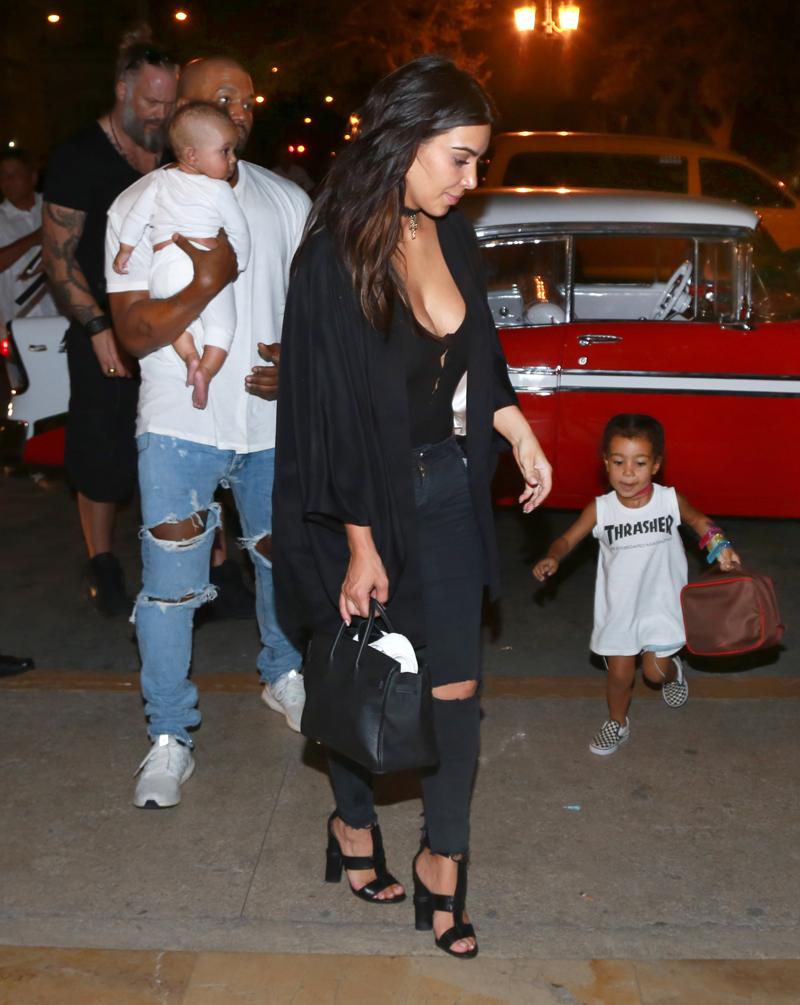 EXCLUSIVE: ***PREMIUM EXCLUSIVE RATES APPLY***STRICTLY NO WEB UNTIL 21.30GMT SATURDAY 7TH MAY 2016*** Kim Kardashian and Kanye West arrive with Saint West as the baby makes first public appearance to the Parque Central hotel in Cuba.