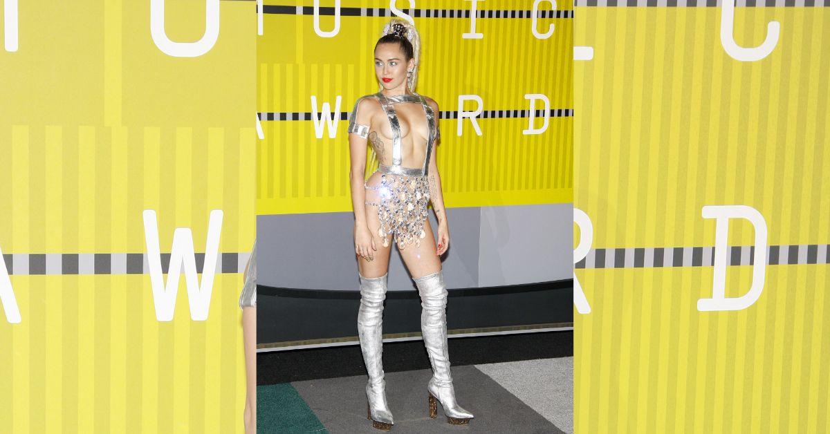 miley cyrus flaunts toned physique  golden globes