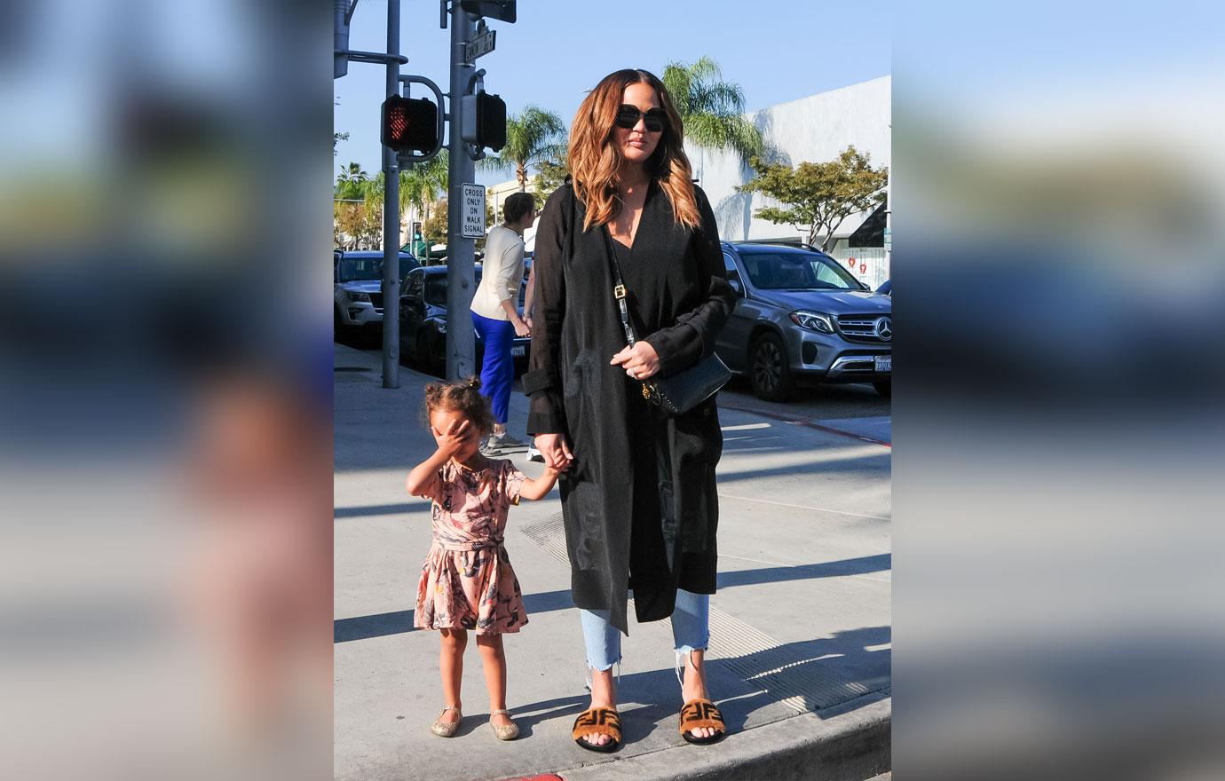 Chrissy Teigen goes shopping with daughter Luna