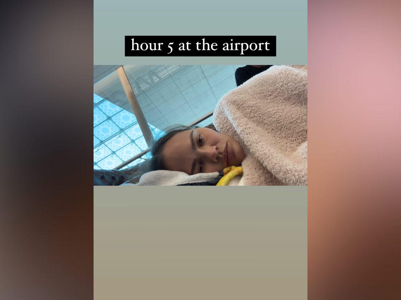 chrissy teigen family stuck dubai airport photos