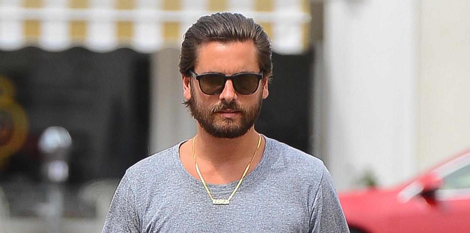 Scott Disick ends a shopping trip at Saint Laurent with a friend