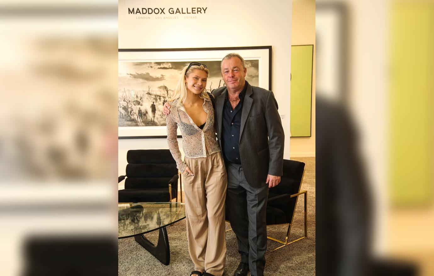 josie canseco david yarrow at the maddox gallery booth for opening night of art miami on tuesday november th photo credit seth browarnik world red eye