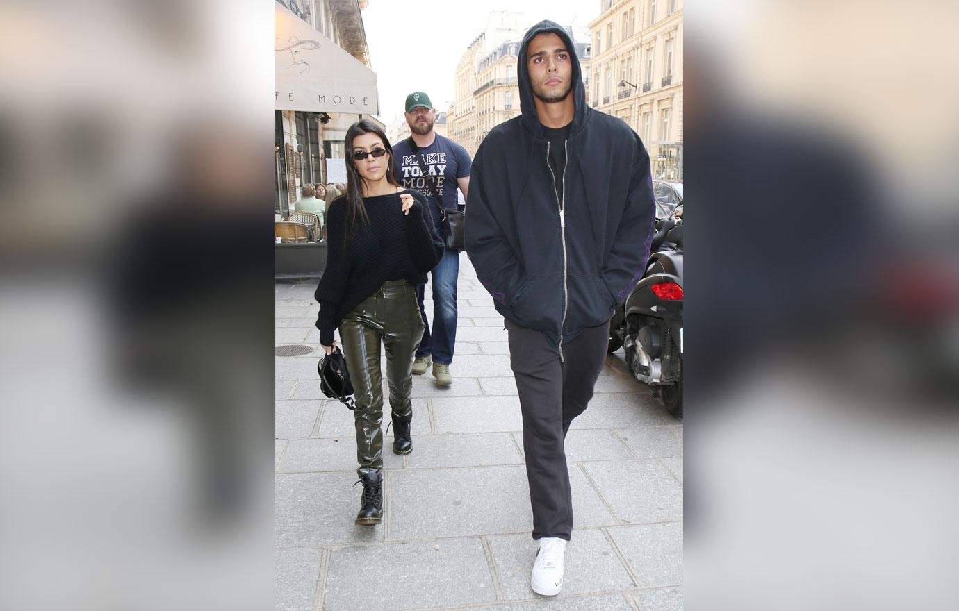 //kourtney kardashian younes bendjima hold hands back together