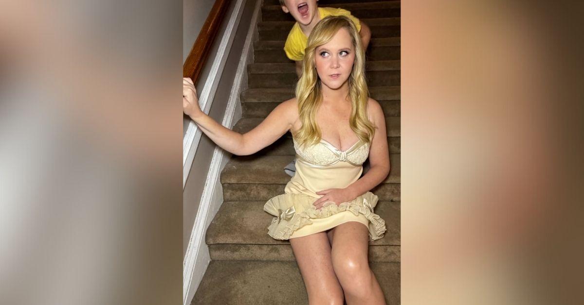 image of Amy Schumer showed off her weight loss in a yellow mini dress.