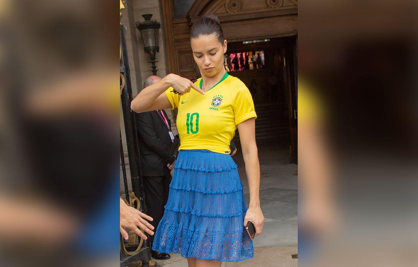 Adriana Lima Wears a Brazil Soccer Jersey At Couture Fashion Week