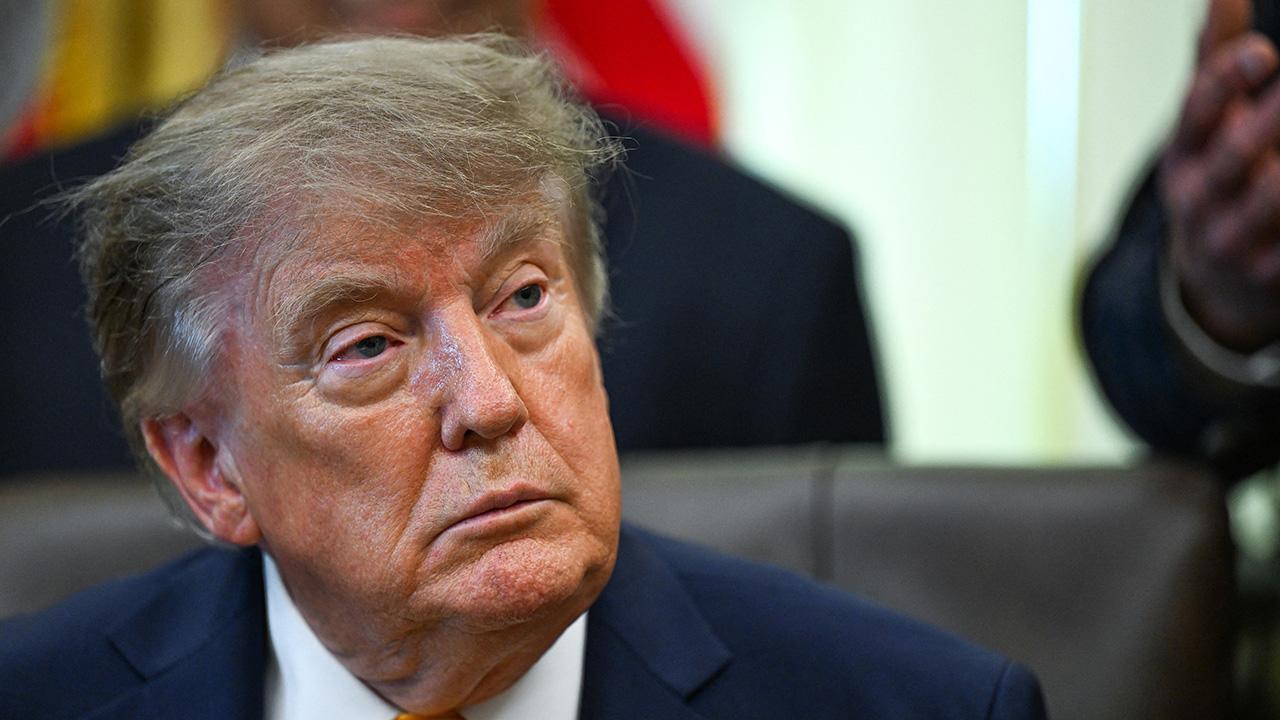photo of The president called Kaitlan Collins 'very dumb' in a September 8 Truth Social post.