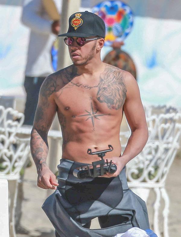 Abs For Days! Lewis Hamilton Goes Shirtless During A Beach Getaway!