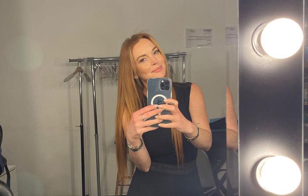 lindsay lohan posts year end recap featuring multiple photos of fiance bader shammas