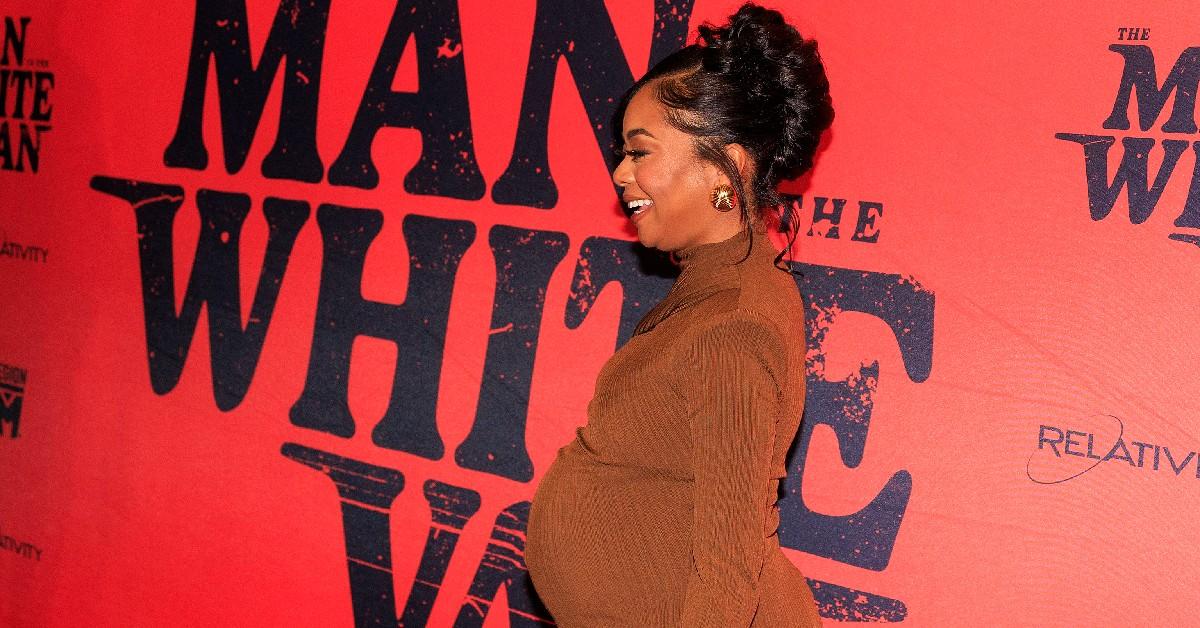 skai jackson shows off baby bump man white van la premiere photos