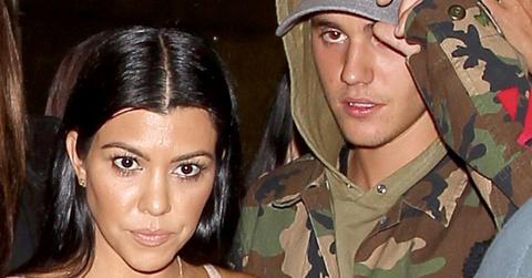 Kourtney Kardashian and Justin Bieber looking happy walking out of The Good Guy together