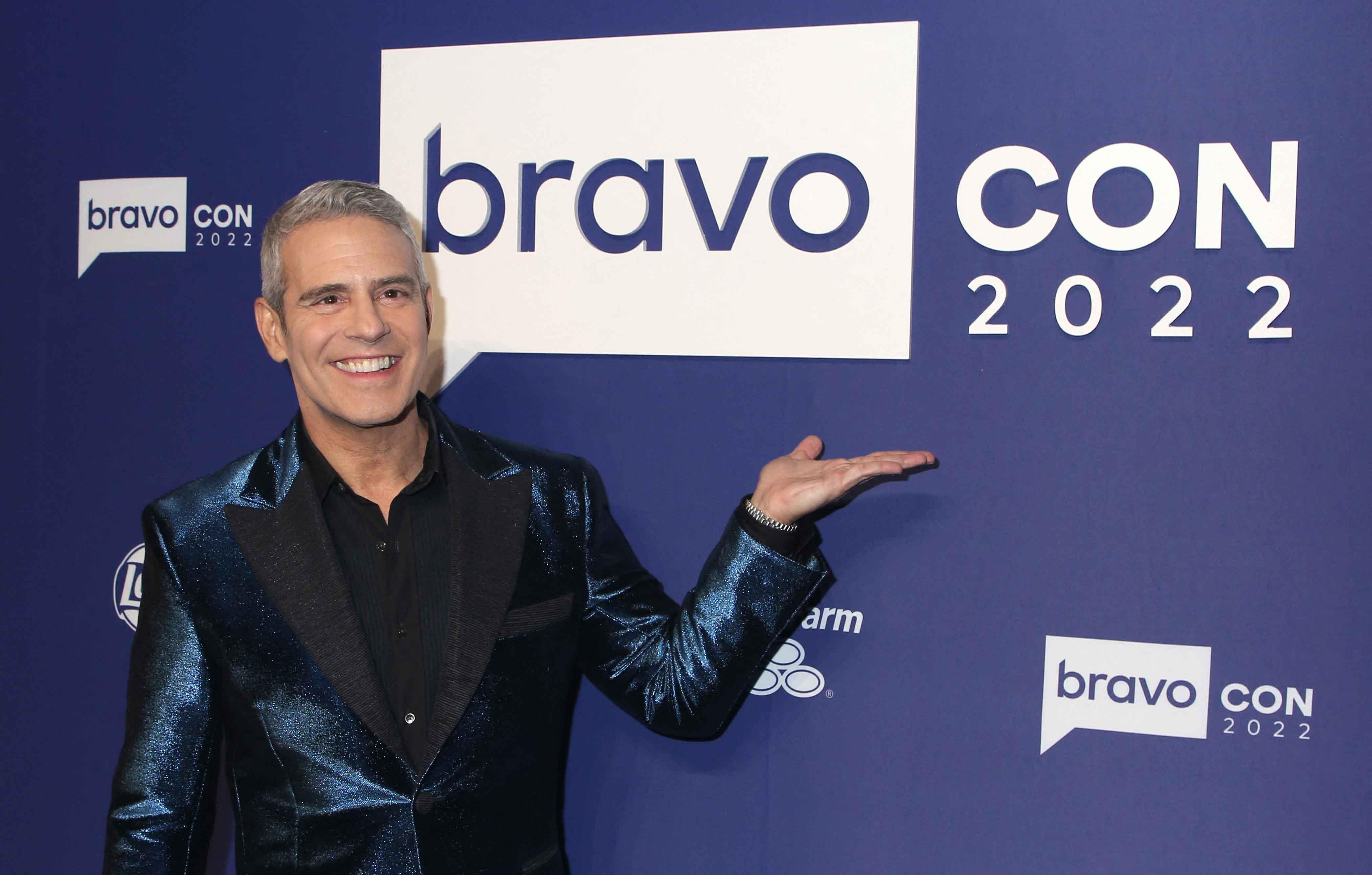 andy cohen bravocon brings together divisive social media