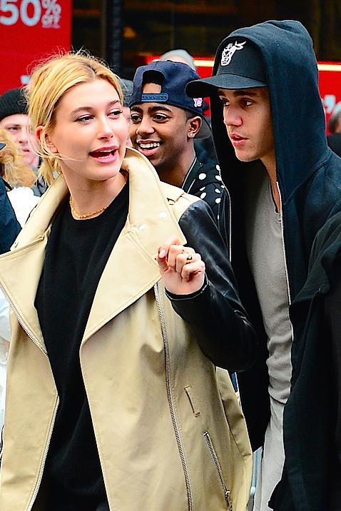 EXCLUSIVE: Justin Bieber skateboards through Times Square with Hailey Baldwin chasing behind