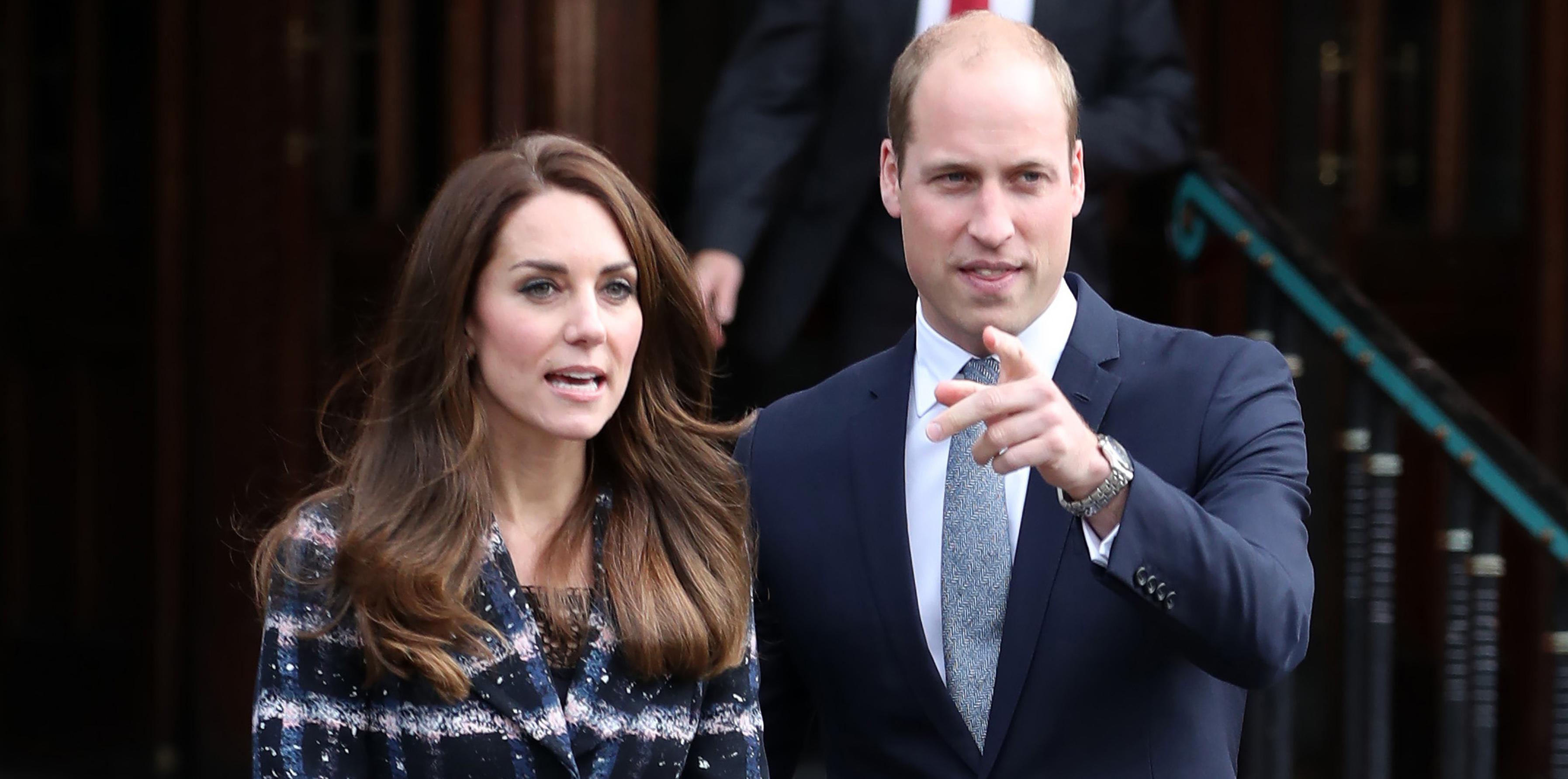 Kate Middleton and Prince William greet their fans as they leave the Manchester Town Hall