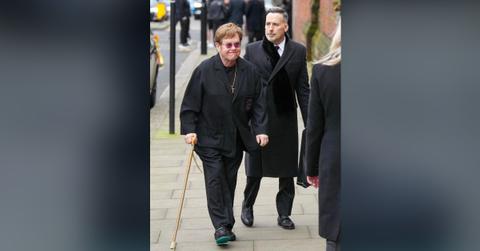 elton john sparks health concerns cane injured foot photos