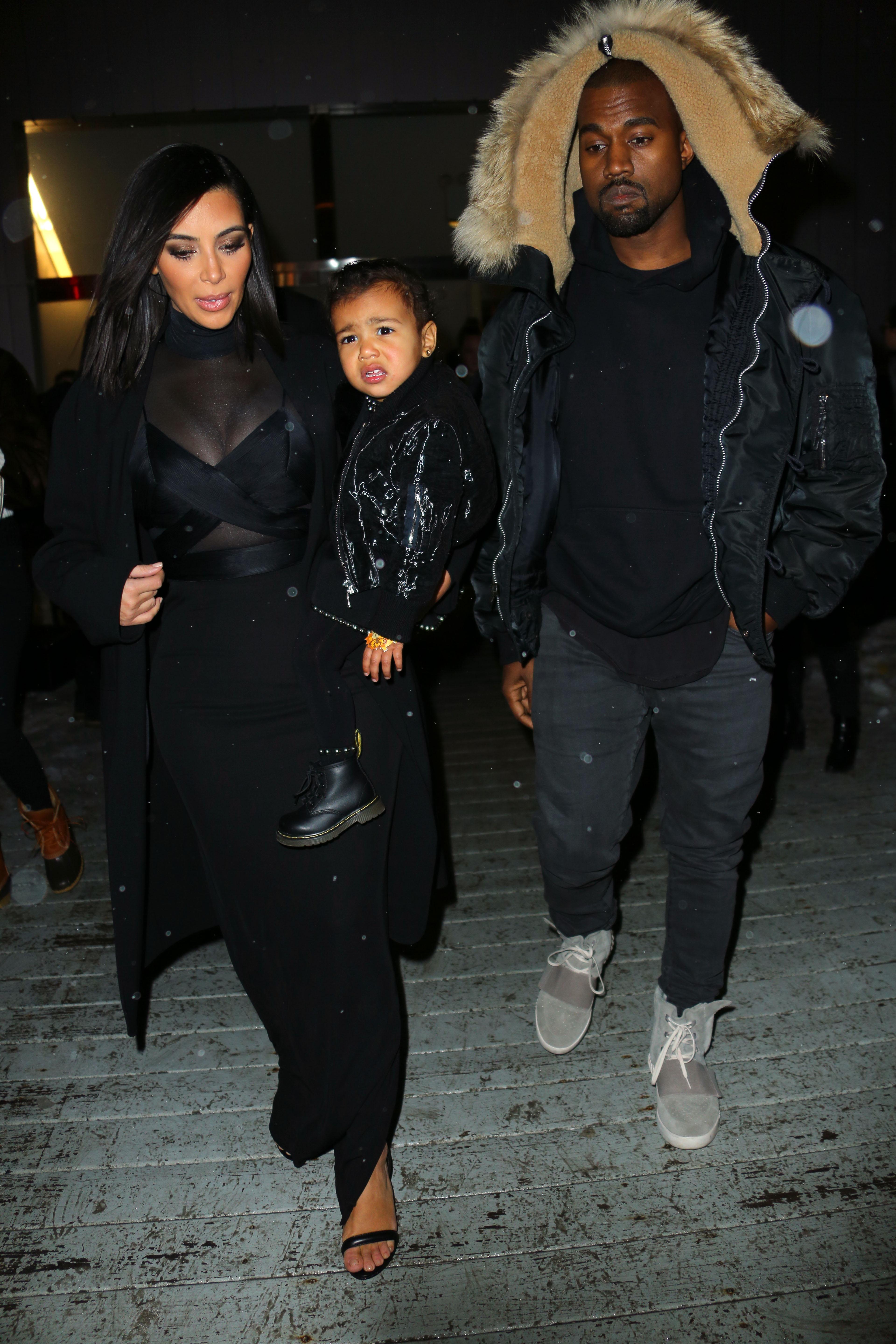 Kim Kardashian and Kanye West take their baby North West to the Alexander Wang show in NYC on Valentine&#8217;s Day