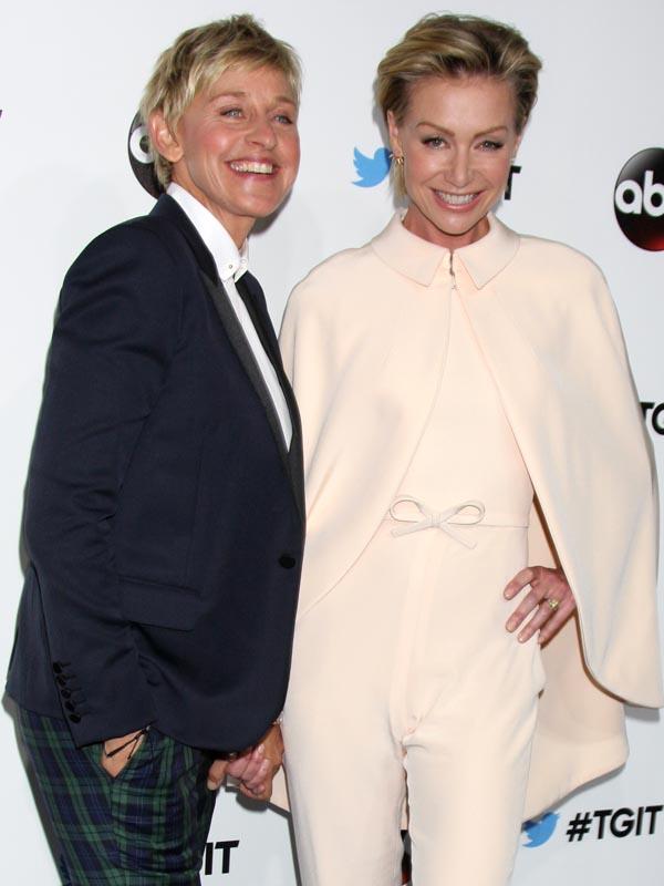 Ellen DeGeneres and wife Portia de Rossi hold hands and walk the red carpet together at #TGIT Premiere Event