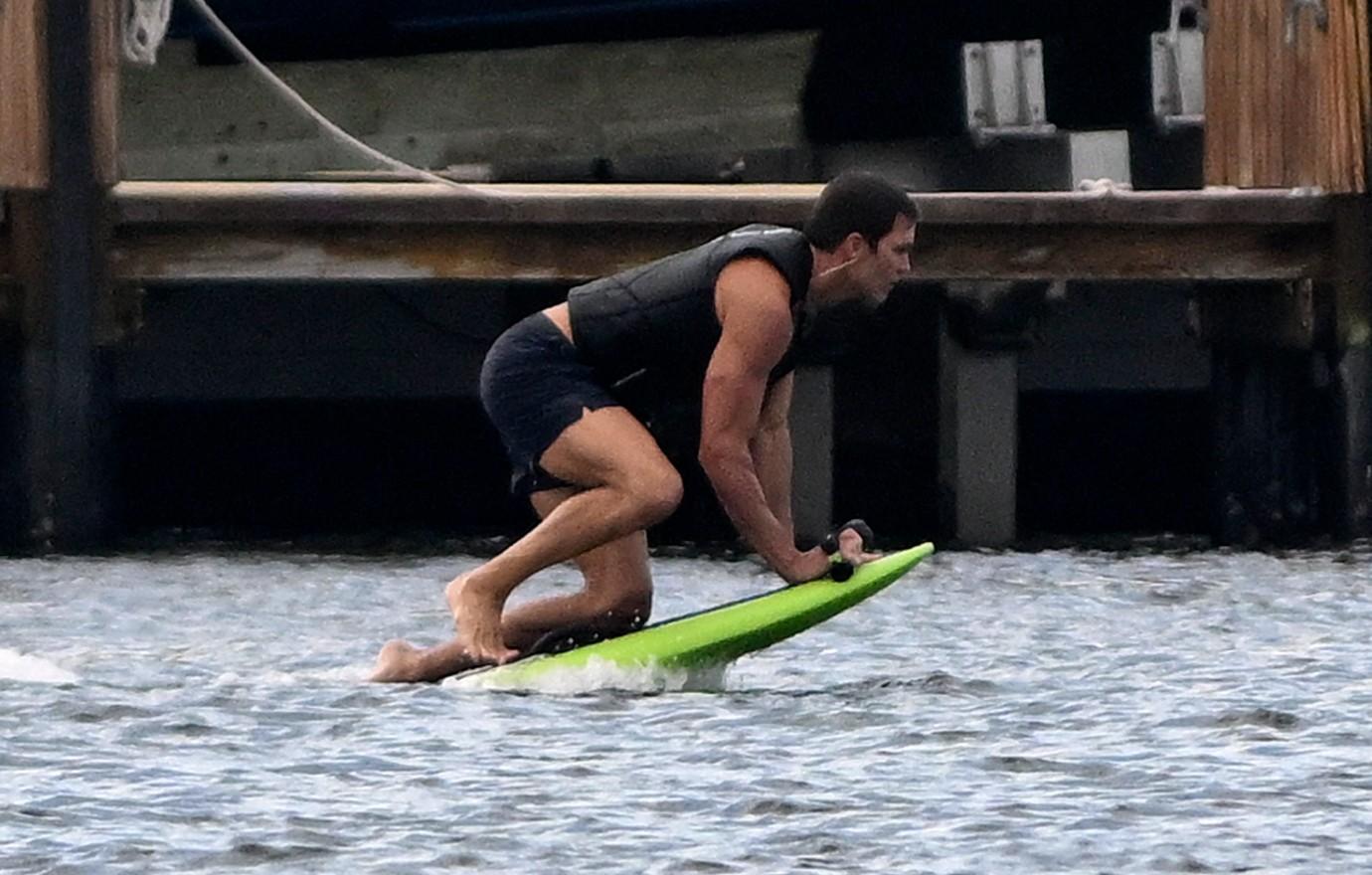 tom brady looks ripped jetboarding outside  million miami mansion