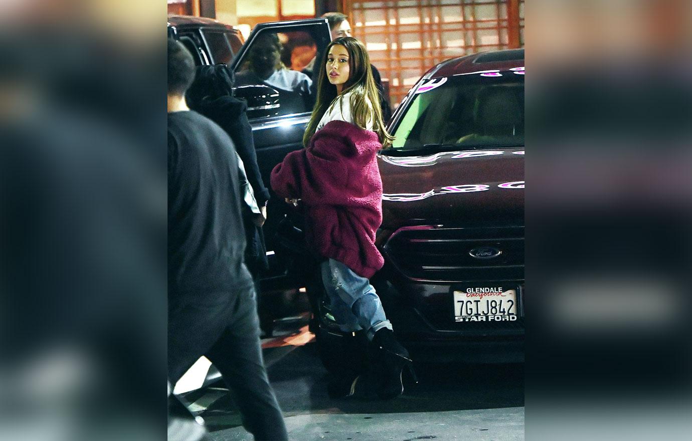 Ariana getting into car