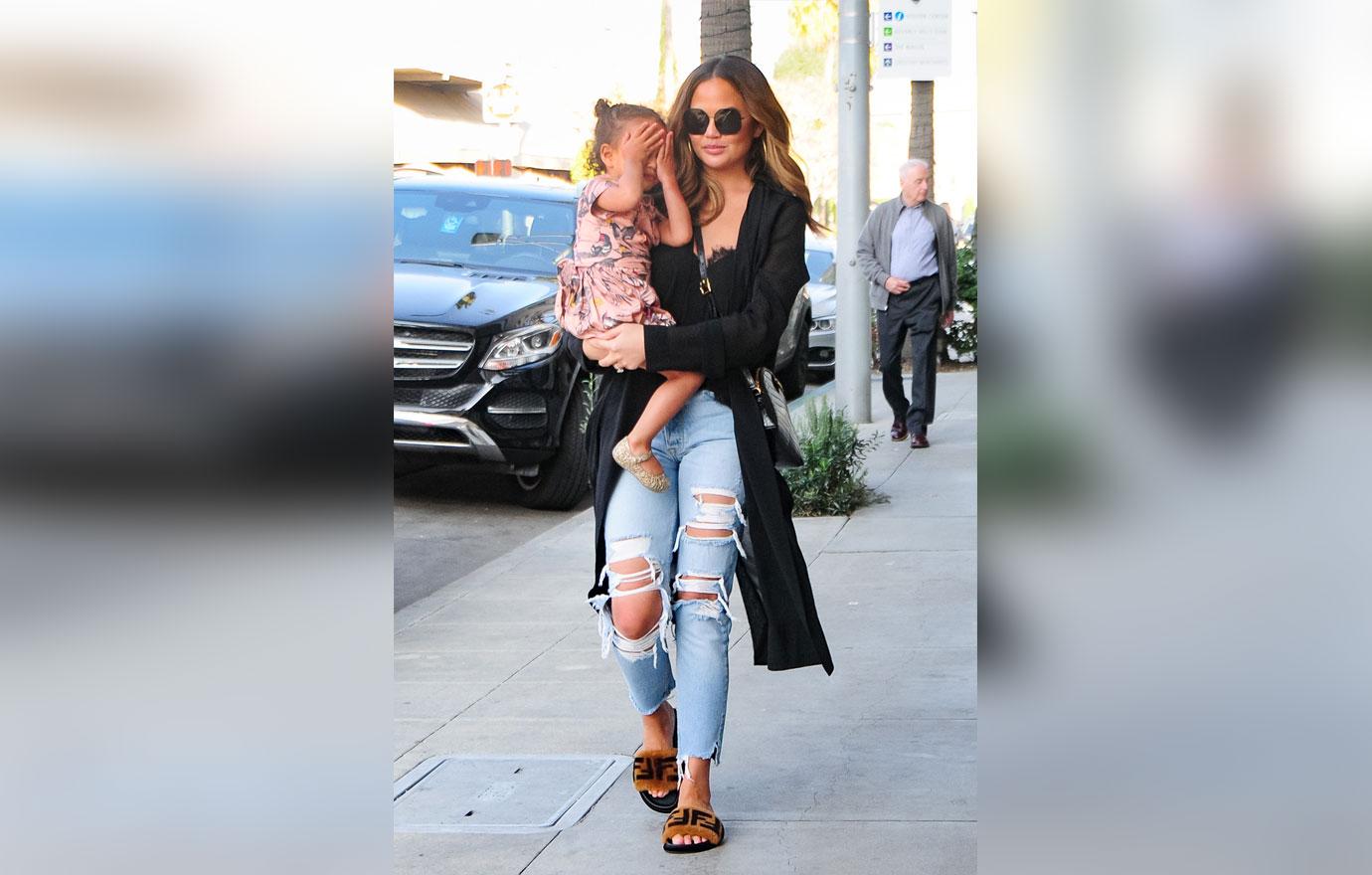 Chrissy Teigen goes shopping with daughter Luna