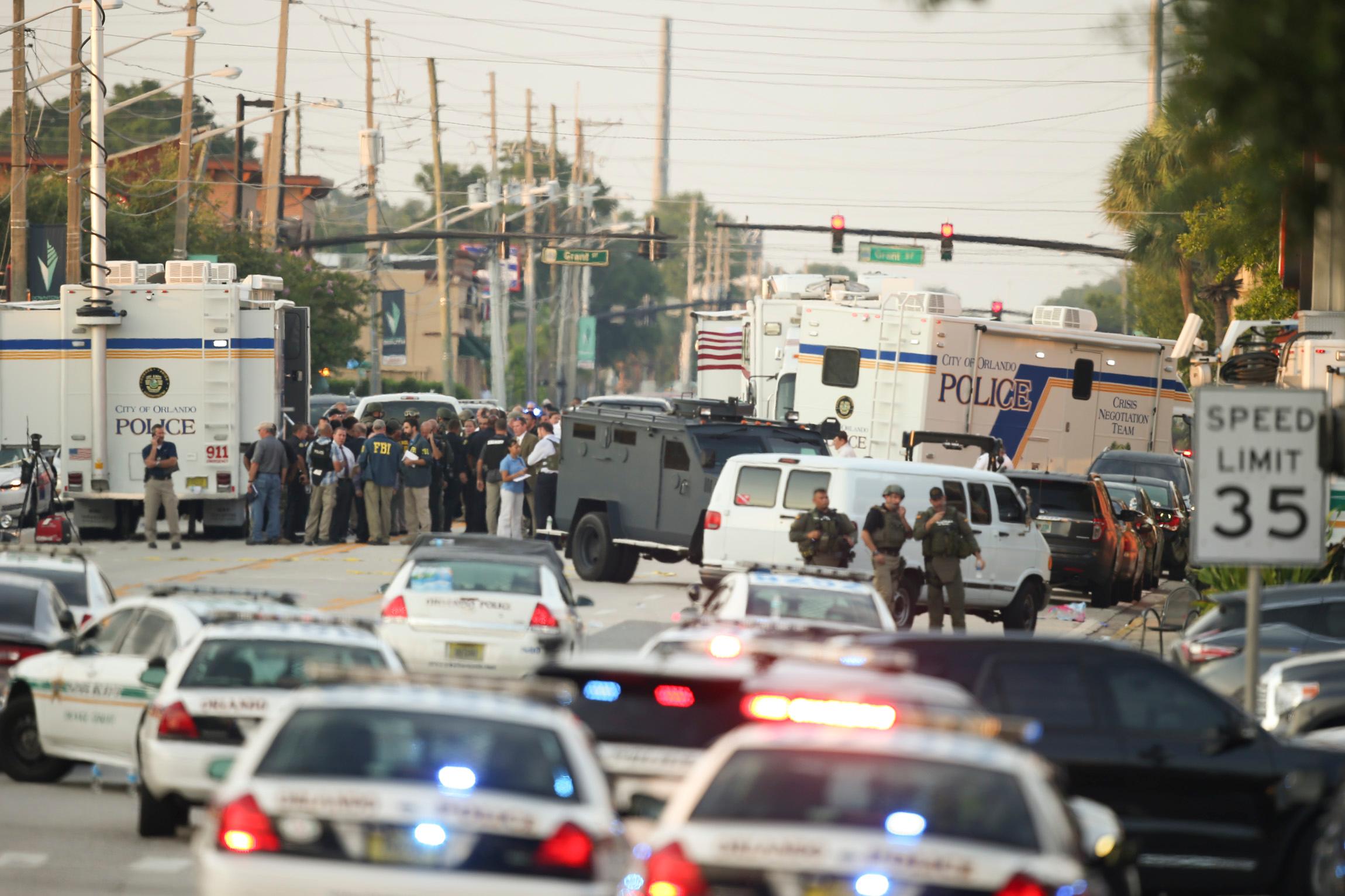 Orlando mass shooting at Pulse nightclub. Police, army, FBI surround club.