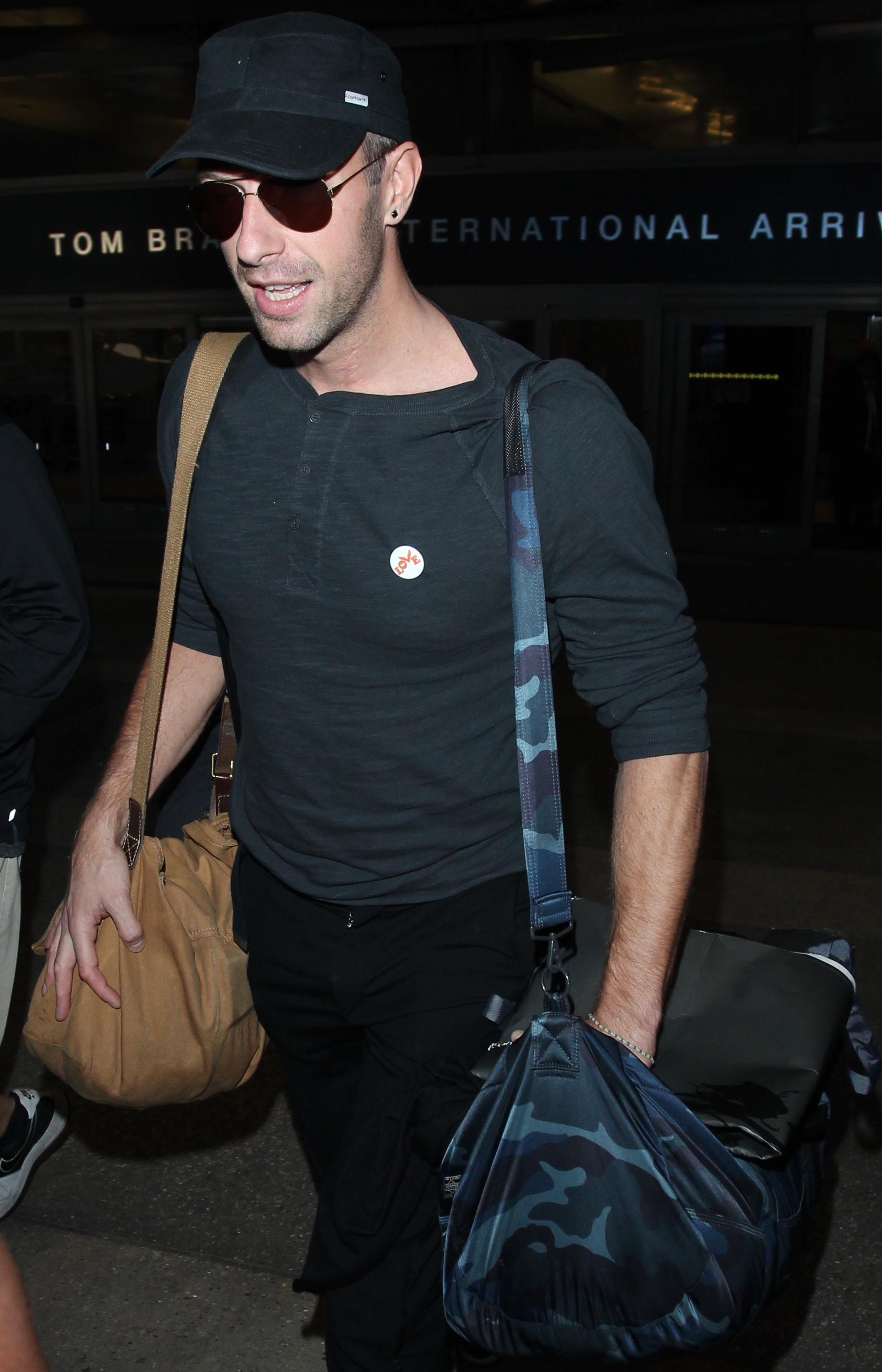 Coldplay frontman Chris Martin is spotted as he arrives at LAX Airport in Los Angeles, CA