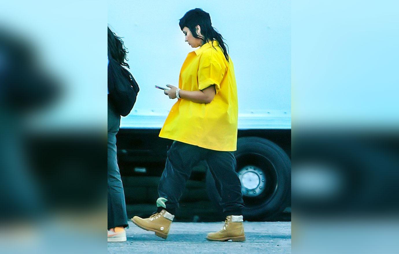 demi lovato sports a funky mullet while on the set of a music video with rapper g eazy in los angeles