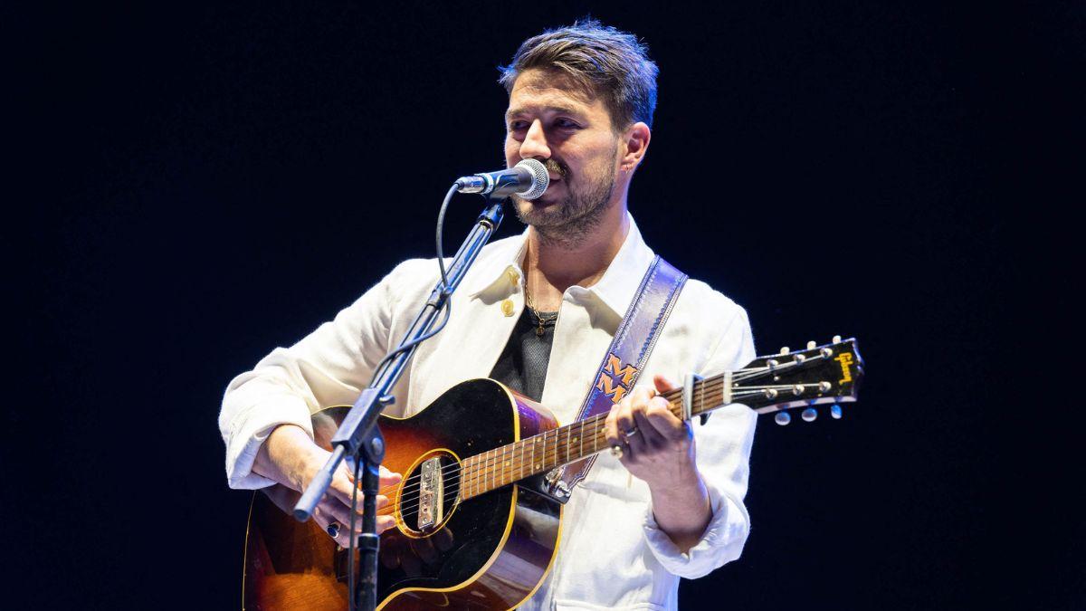 Image of Marcus Mumford discussed backstage etiquette and explained why he usually avoided visiting performers after shows.