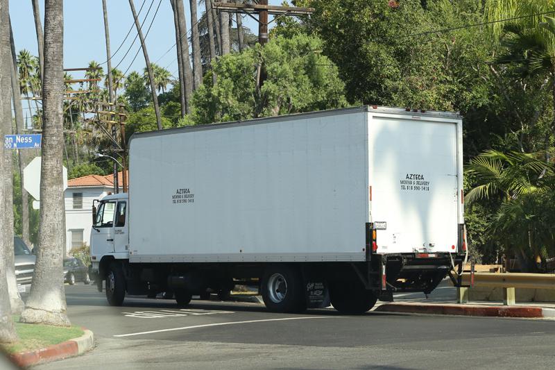 Moving Trucks at Brad Pitt&#8217;s Home