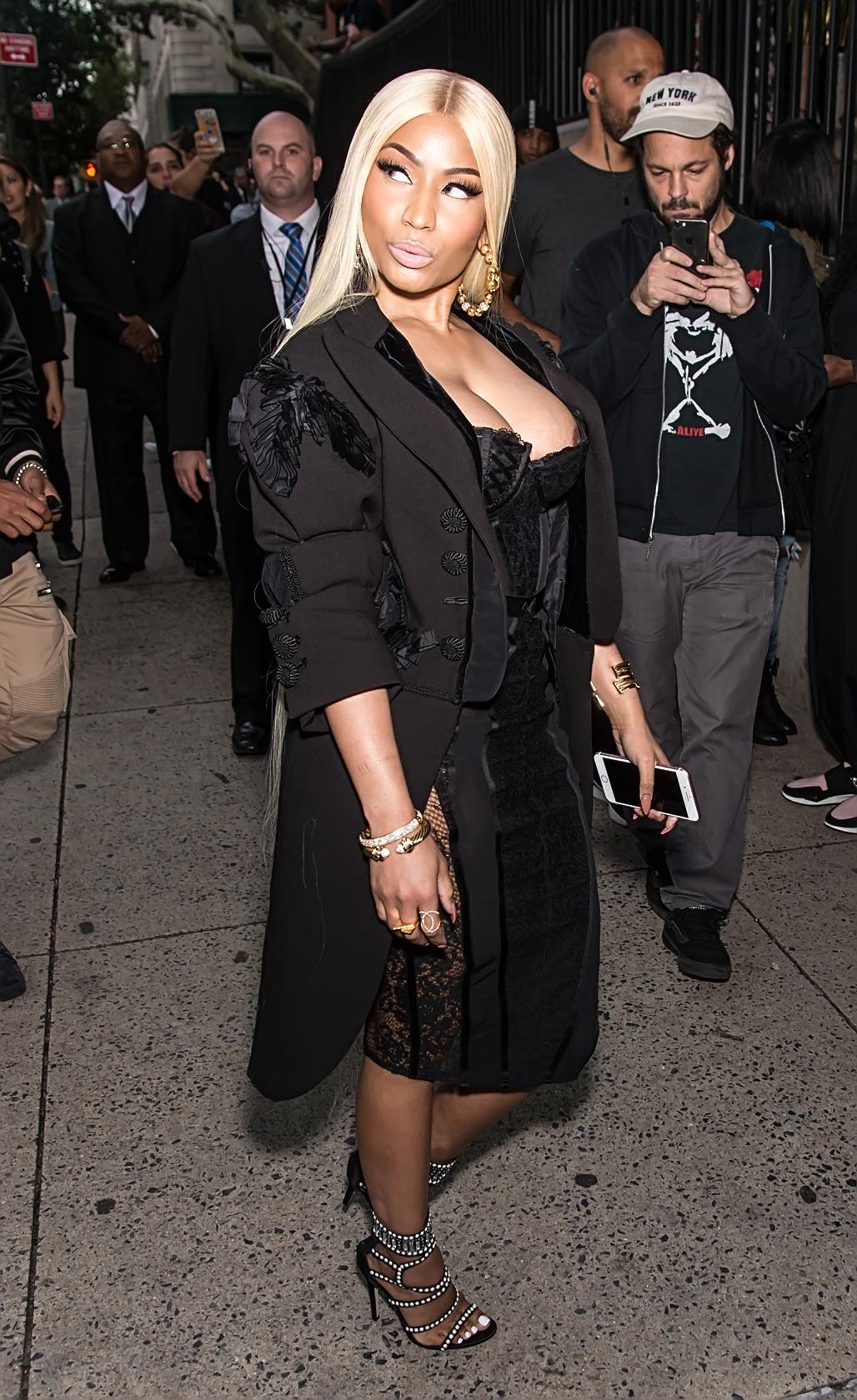 Nicki Minaj suffers an embarrassing nip slip as she attends Marc Jacobs  Fashion Show in NYC (