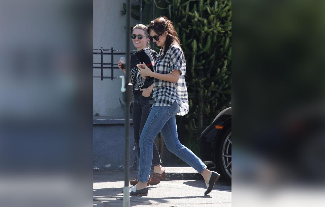 *EXCLUSIVE* Dakota Johnson looking hot in plaid grabs coffee in West Hollywood