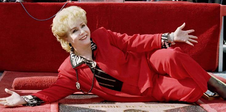 FILE PHOTO: Debbie Reynolds arrives at the 40th anniversary restoration of the film &#8216;Cabaret&#8217; at the 2012 TCM Classic Film Festival in Hollywood