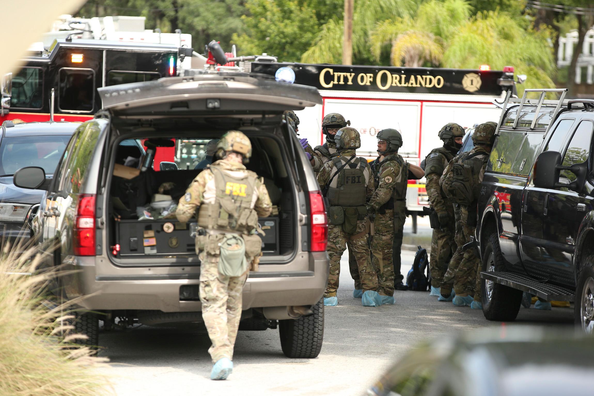 Orlando mass shooting at Pulse nightclub. FBI outside the club Sunday morning.