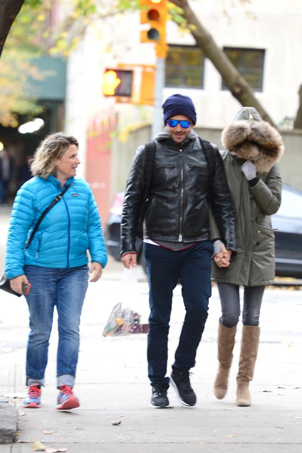 A chatty fan joins Bradley Cooper and girlfriend Irina on their Romantic Walk **USA ONLY**