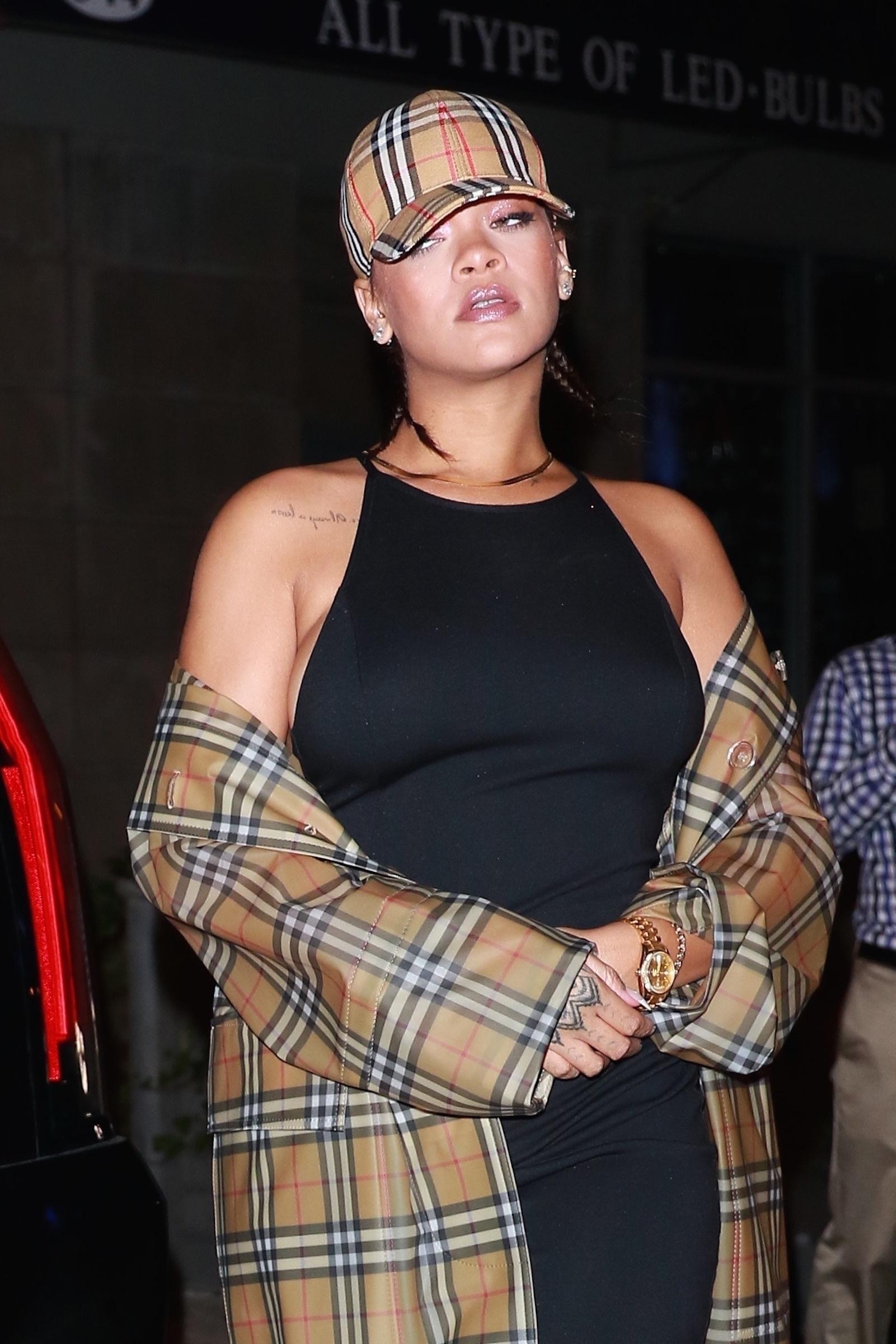 *EXCLUSIVE* Rihanna decks herself in Burberry for dinner in the Big Apple