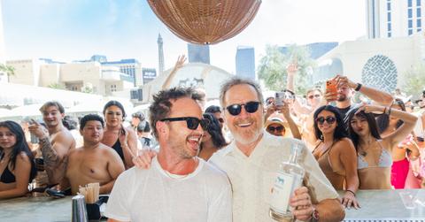 breaking bad reunion bryan cranston aaron paul get behind the bar and the dj booth for wild tequila bash in vegas