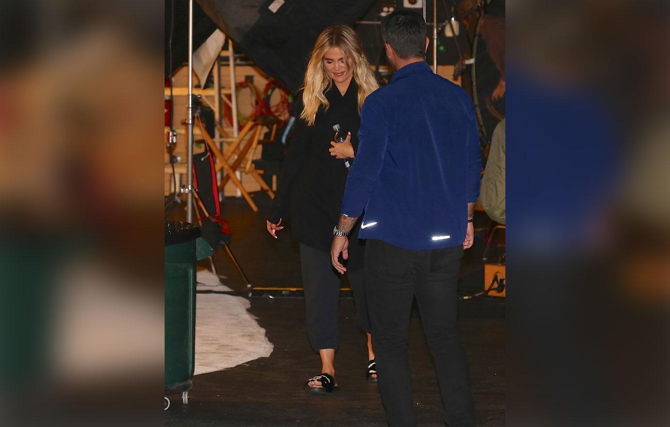 Khloe Kardashian Hides Baby Bump Coat 2