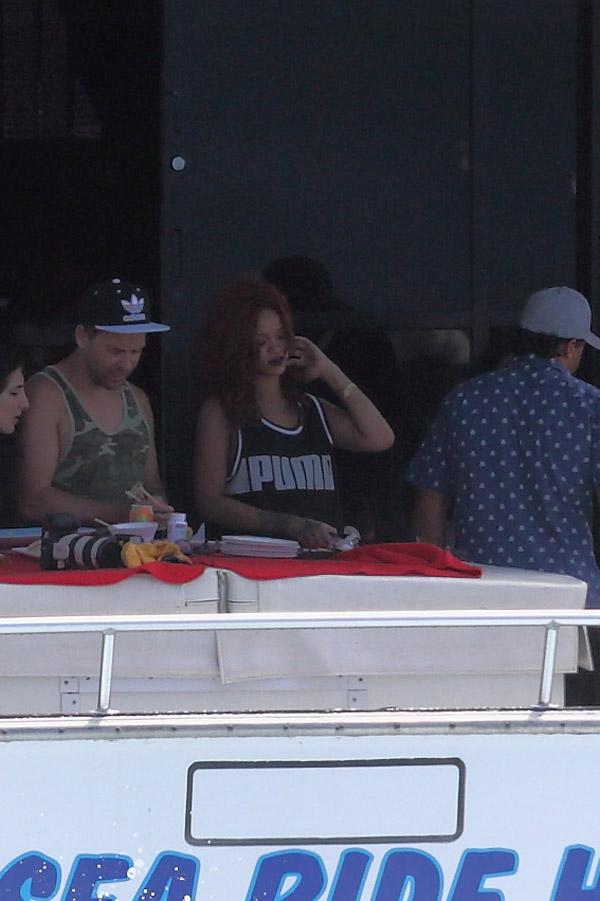 Rihanna goes for a boat ride while on vacation in Hawaii.