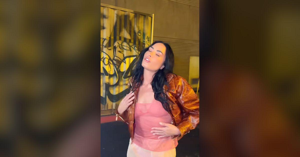 demi lovato flaunts lean physique see through top new music watch