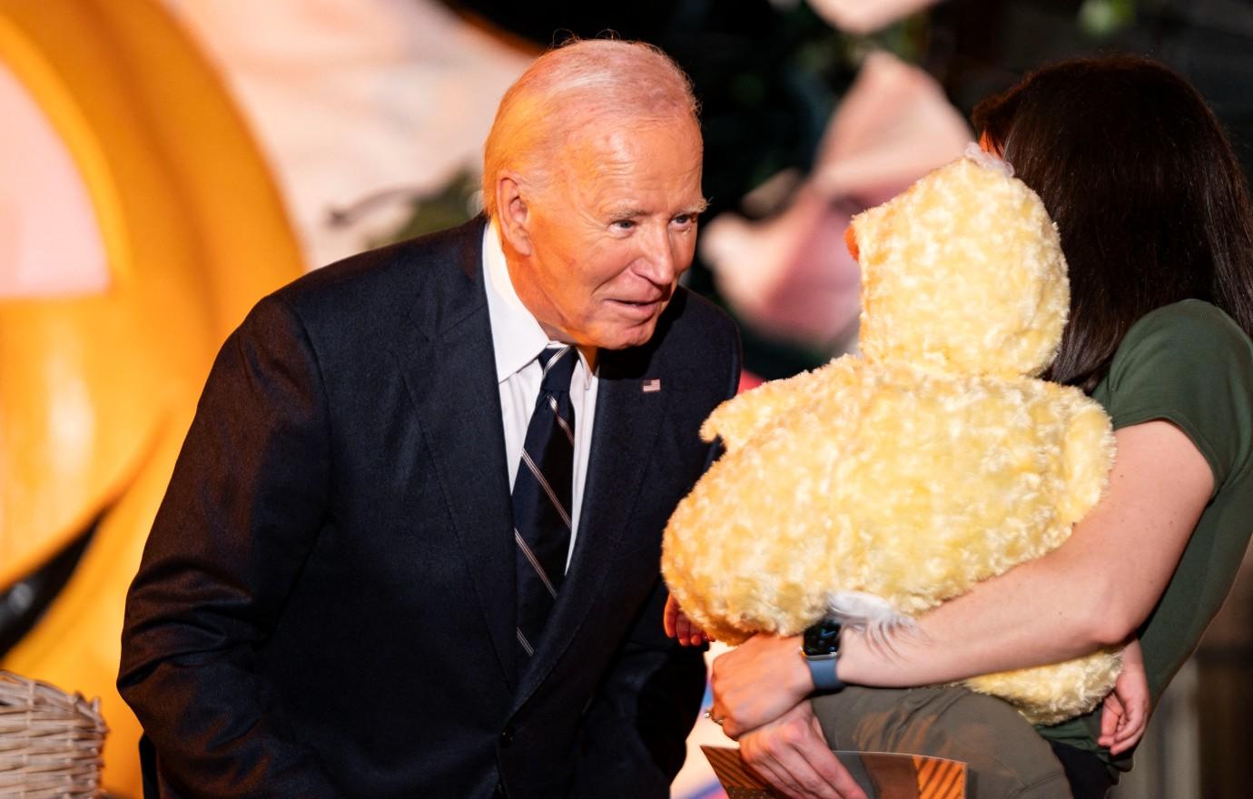 joe biden faces backlash pretending bite babies halloween creepy