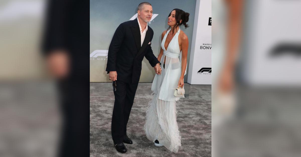 brad pitt ines de ramon hold hands red carpet f premiere nyc photos