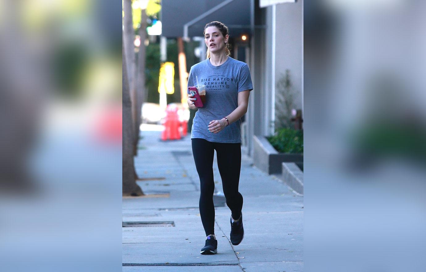 Kaia Gerber showcases her mile-long legs in heather grey leggings while  leaving her Pilates class
