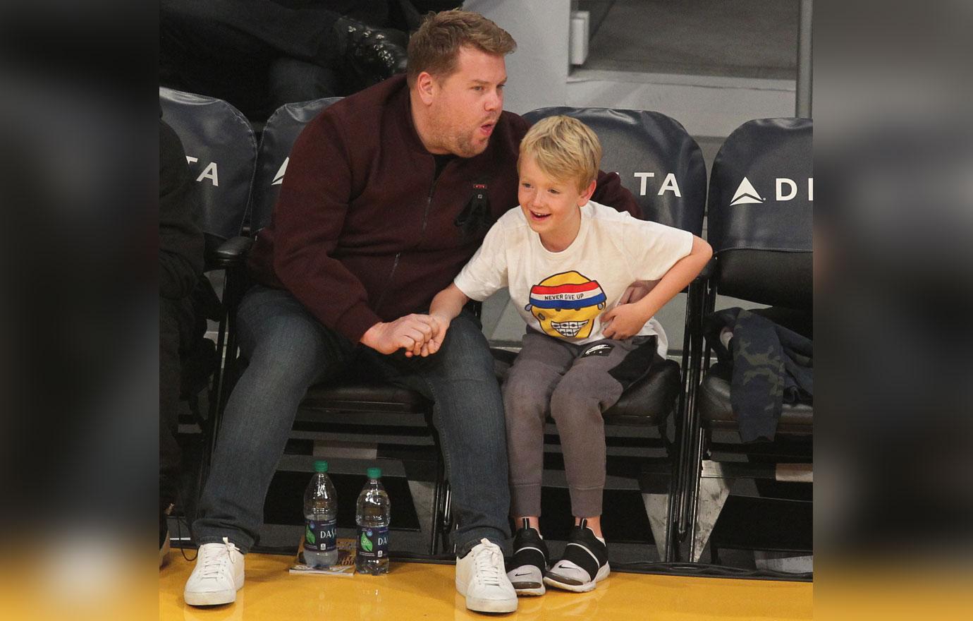 Talk Show host and Comedian James Corden and his son Max hang out at the Lakers Game