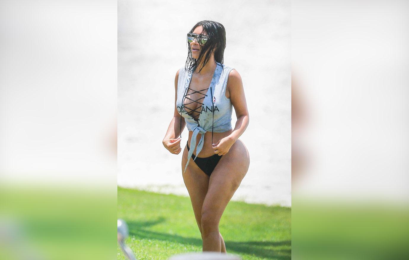 PICS] Kim Kardashian Displays Curves In Barely-There Bikini Thong!