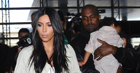 Kim Kardashian & Kanye West Catch A Flight With North