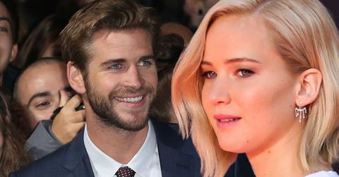 Jennifer lawrence liam hemsworths sparks flying hunger games mockingjay press tour